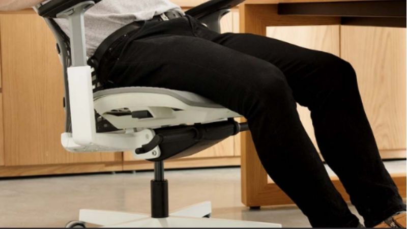 why do office chairs lean back